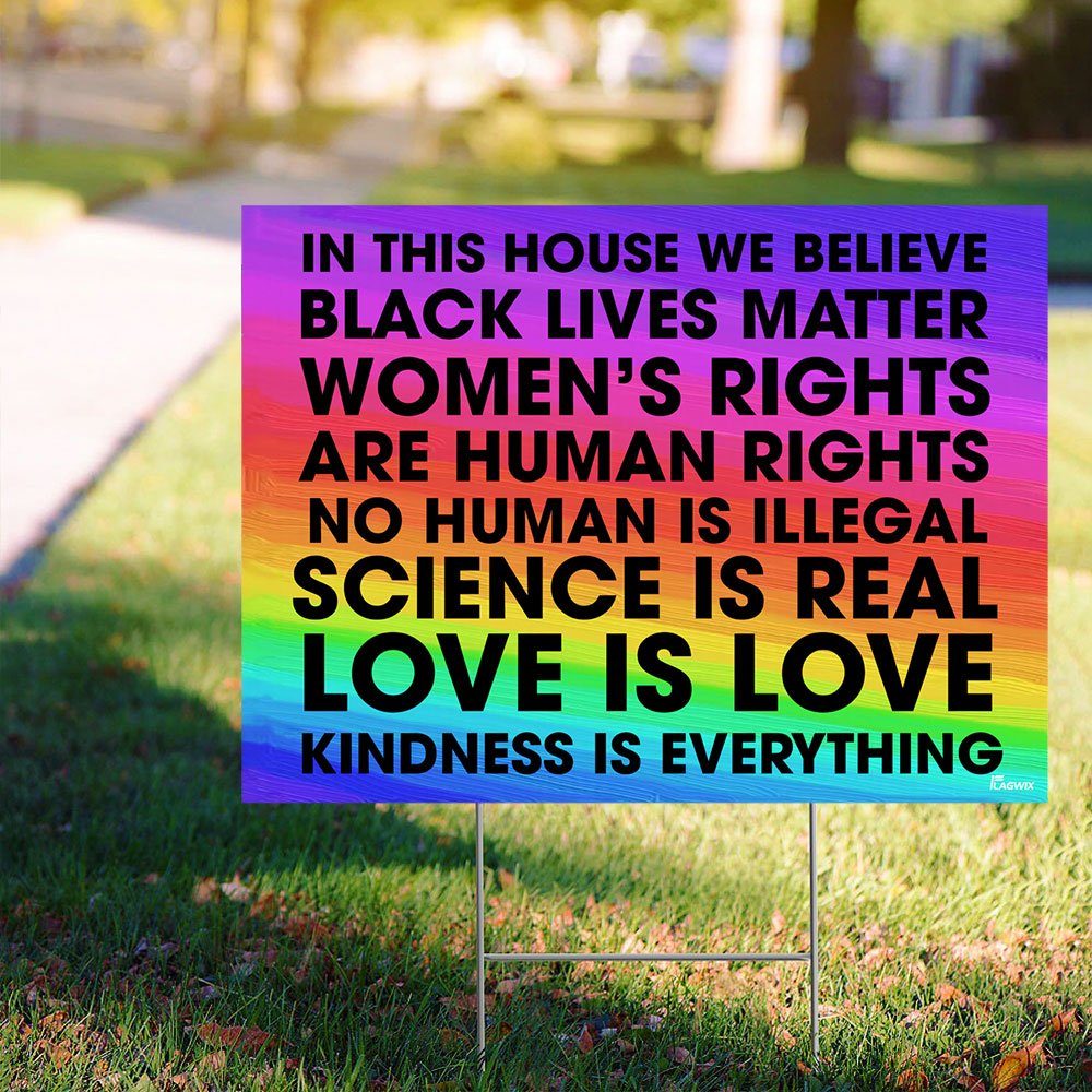 In This House We Believe Yard Sign