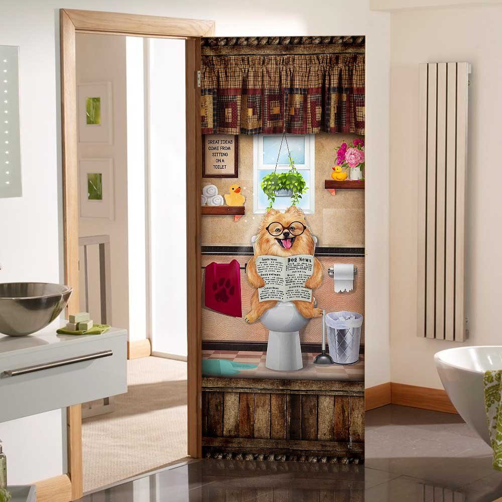 Pomeranian Puppy Sitting On A Toilet Door Cover