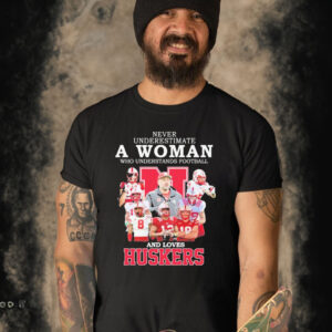 Official never Underestimate A Woman Who Understands Football And Loves Huskers Shirt